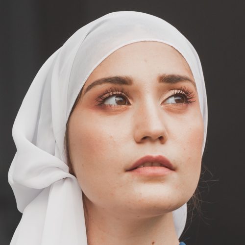 young-asian-muslim-woman-portrait-in-head-scarf-sm-2021-12-09-17-24-08-utc-Cropped.jpg